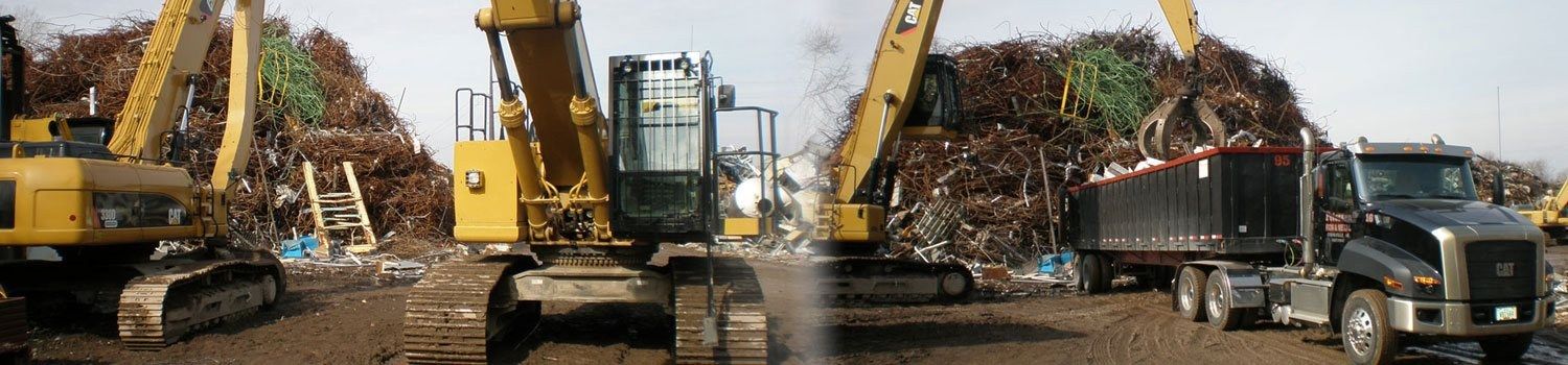 Scrap handling equipment and trucks at Petersen Iron & Metal